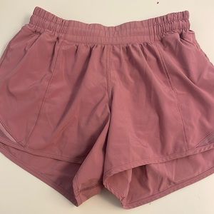 lululemon hotty hot 4 inch inseam, purple pink color. inner lining intact